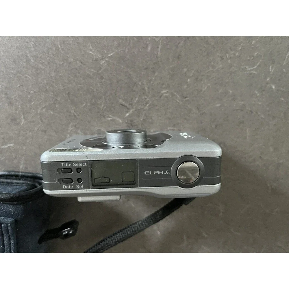 Canon Elph Jr APS Cartridge Film Camera with strap and carry case